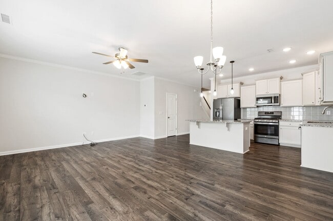 Building Photo - Stylish 4-Bedroom Townhome with Backyard O...