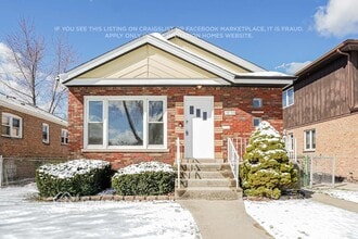 Building Photo - 5850 S Natchez Ave