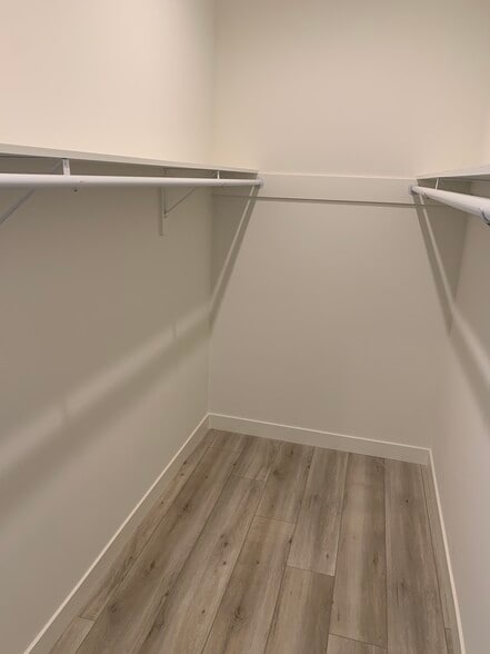 Primary bedroom walk-in closet - 20344 Lorne St