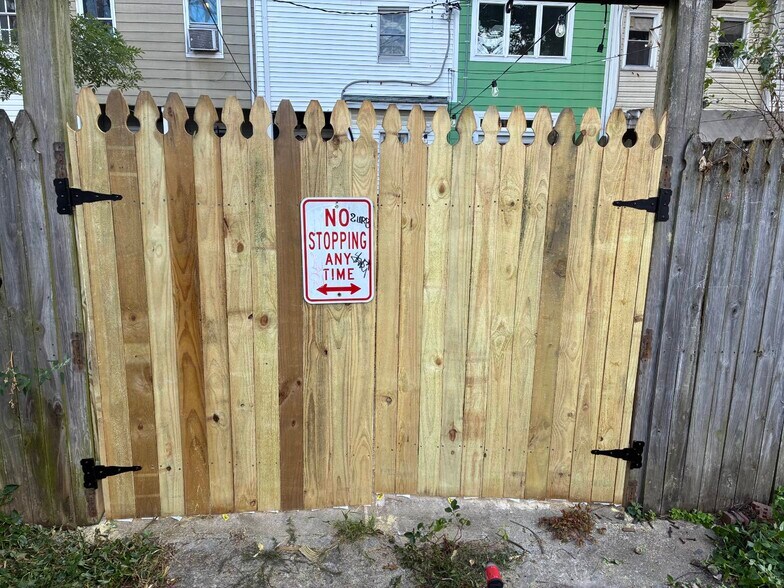 New Fence with Lock - 2539 N Howard St