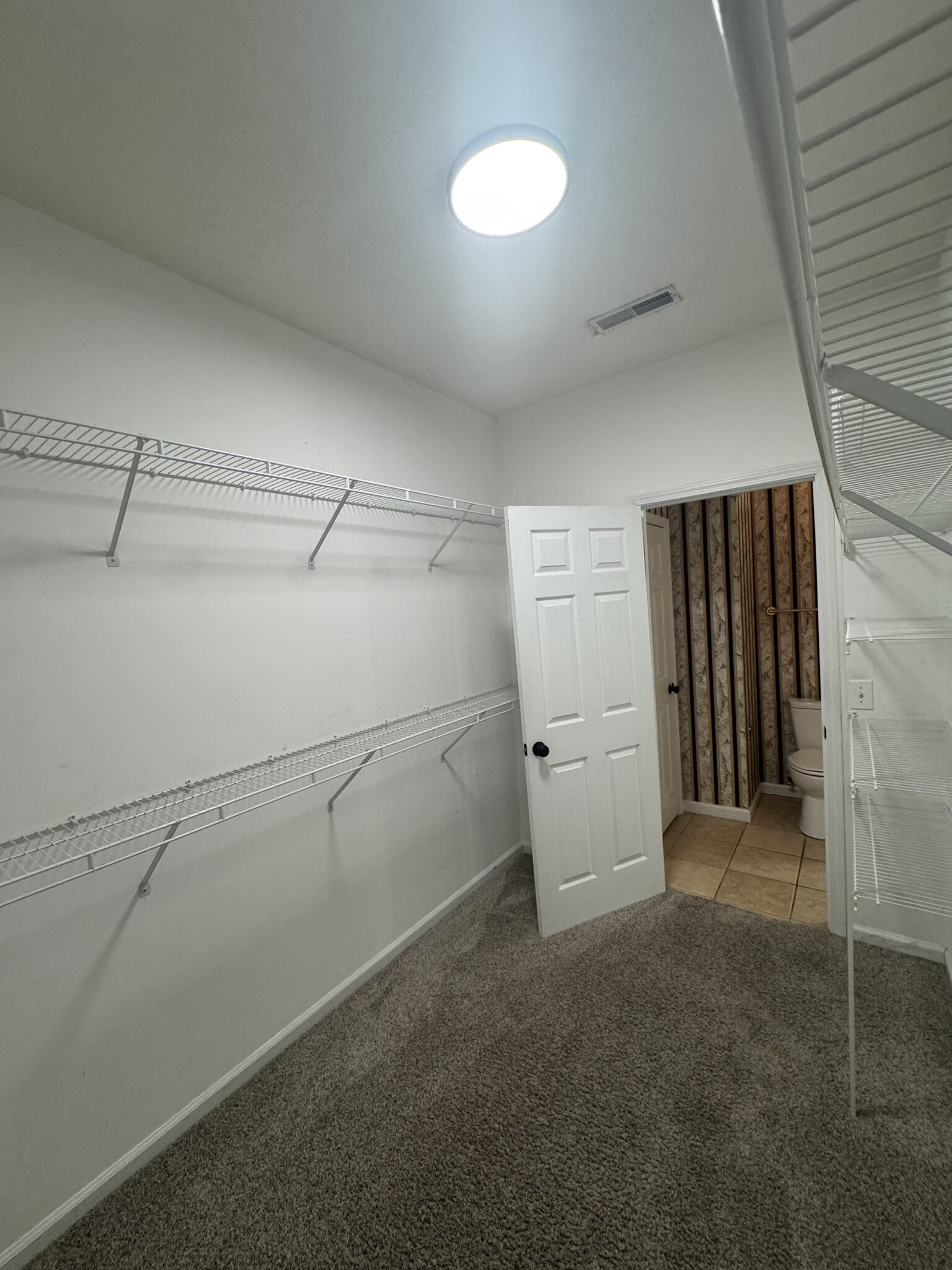 Master walk-in closet. - 1701 Water Oak Dr