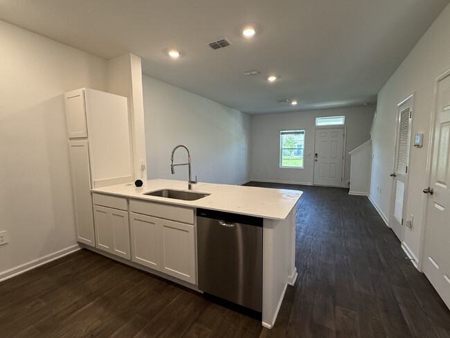 Building Photo - "Charming 2-Bedroom Townhouse Retreat with...