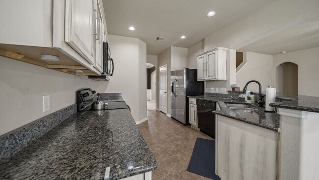 Building Photo - Beautiful 4-bedroom home in the sought-after Lake Conroe Hills community!