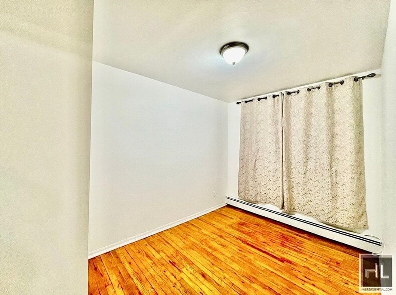 Building Photo - 2 bedroom apartment available near the R line
