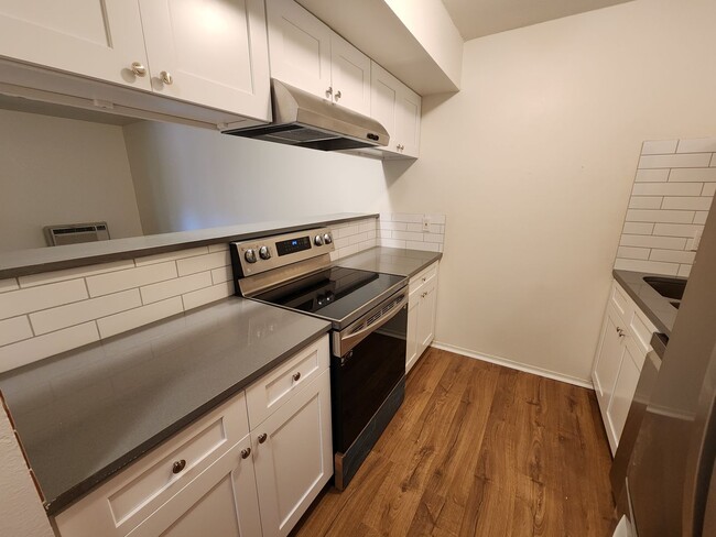 Building Photo - Brand new beautifully renovated Condo with...