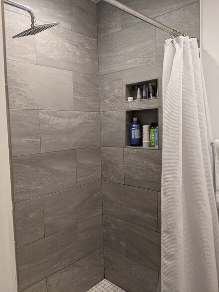 Large stone shower with niche for storage - 12 Melrose St