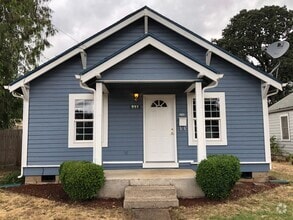 Building Photo - Comfortable 3-Bedroom Home with Huge Backy...
