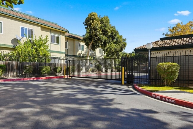 Building Photo - New Remodeled, Downstairs with Two Patios, Gated Community with Pool