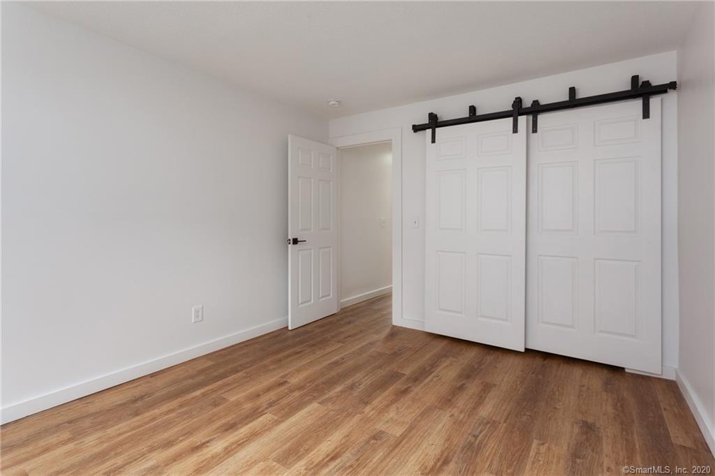 Large bedroom with ample closet space - 188 Flax Hill Rd