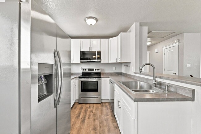 Building Photo - $2,095.95, 4 bed, 2 bath, located in Colorado Springs with a fenced-in backyard.