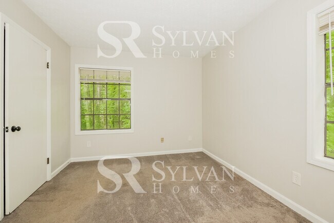 Building Photo - Immerse yourself in comfort and convenience