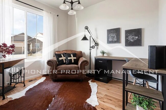 Building Photo - Stylish Main-Level Living with Finished Ba...