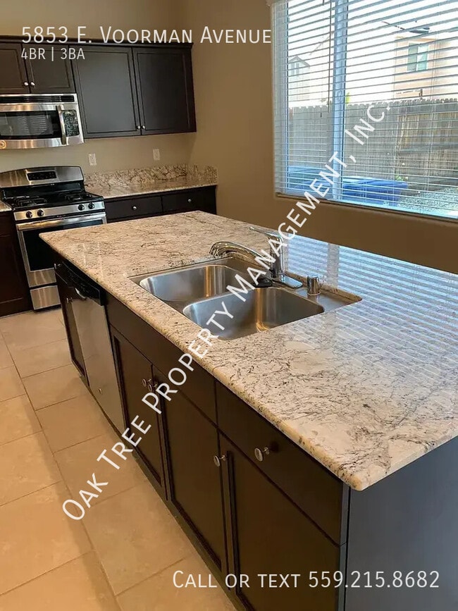 Building Photo - 5853 E Voorman Ave