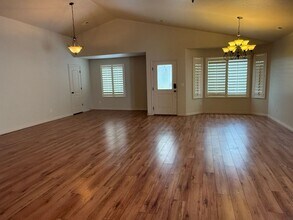 Building Photo - Beautiful patio home with 2 car garage, central air, fenced yard and covered patio