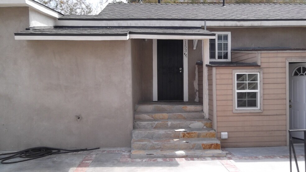 Building Photo - 1153 W 37th Pl