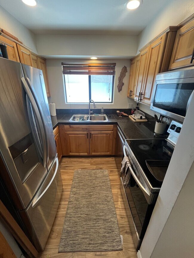 Building Photo - COMING SOON_ MAY| 2-Bedroom Condo | 2 Full Baths | Covered Parking