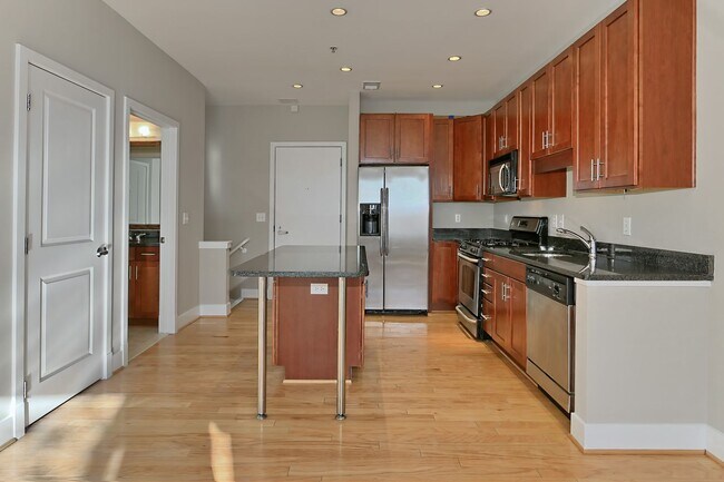 Building Photo - Unique Two-Level Condo