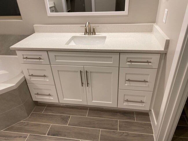 Building Photo - 3 Bedroom Townhome. Water, Sewer, and Garbage Included!