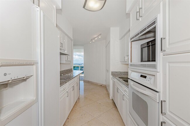 Building Photo - 4779 Collins Ave