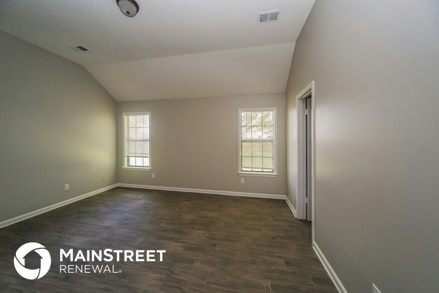 Building Photo - 6740 Stewart Forest Cove E