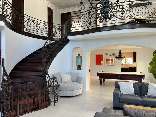 Living room & grand staircase - 4513 Tyrone Ave