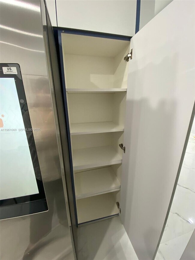 Building Photo - 5005 Collins Ave