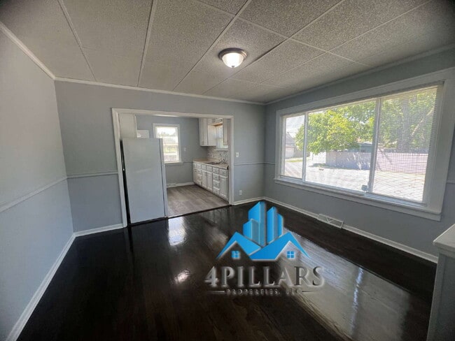 Building Photo - "Charming 3-Bed Home with Partially Finished Basement & Gleaming Hardwood Floors in Hammond - 226...