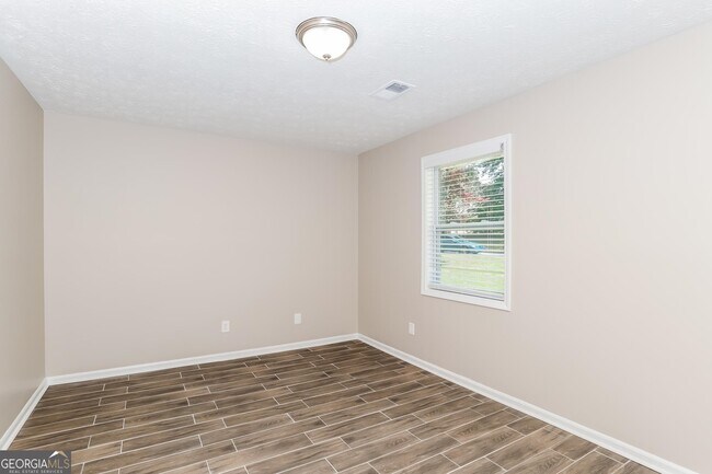 Building Photo - 9073 Woodgreen Way