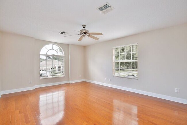 Building Photo - Stunning 4/3 Pool Home with a Bonus Room a...