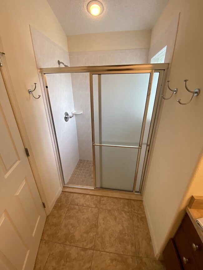 Building Photo - SEASONAL RENTAL. Large 4 Bed + 4 1/2 Baths Home, w/Views of the Jacaranda Golf Course and Lake in...