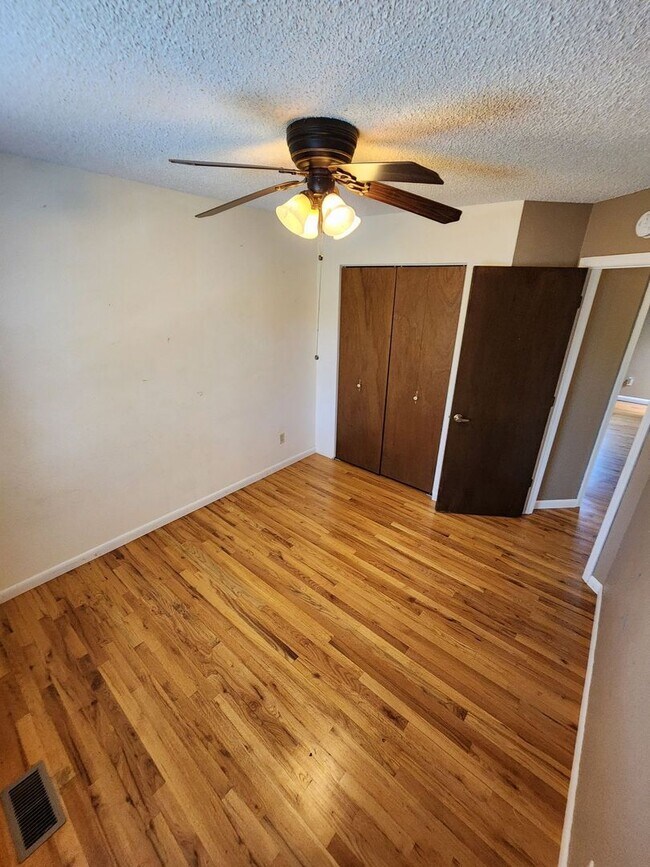 Building Photo - Spacious 4-Bedroom Home with RV Parking in...