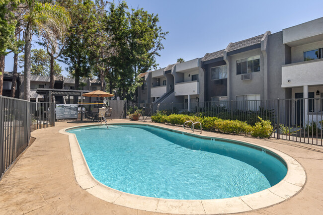 Enjoy a refreshing escape at Scripps Poway Villas' sparkling swimming pool, perfect for relaxation. - Scripps Poway Villas