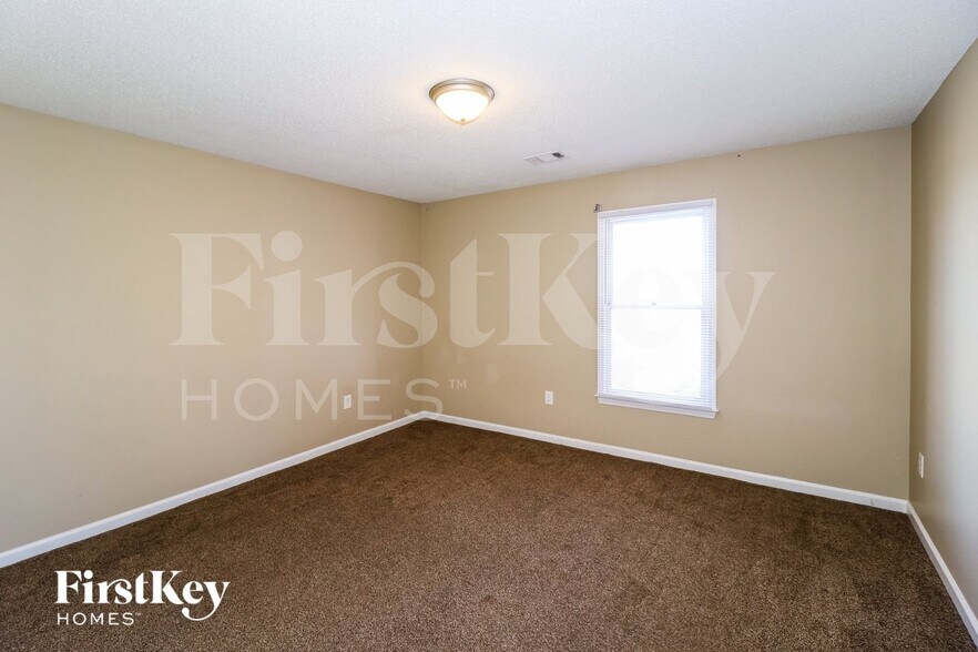 Building Photo - 9095 Strawberry Ln