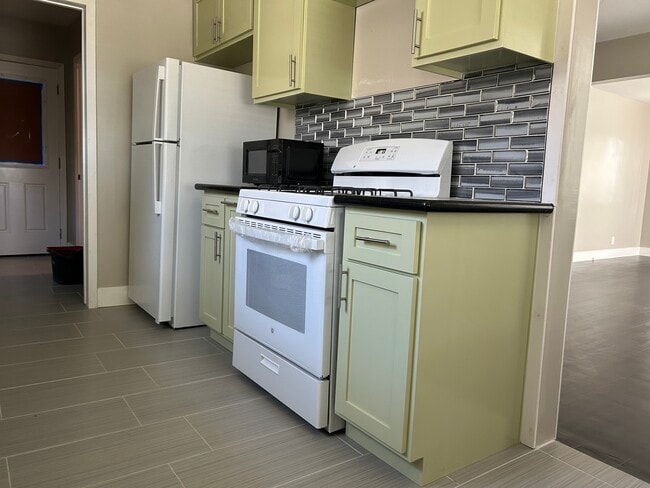 New custom kitchen with new appliances - 5303 W Slauson Ave