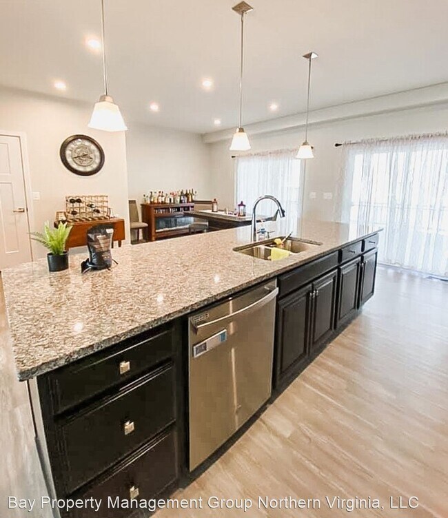 Building Photo - 4 br, 3.5 bath House - 7751 Blackburn Ridg...