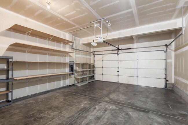 Building Photo - 3 Bedroom Home with Open Layout, Large Garage & Primary Suite