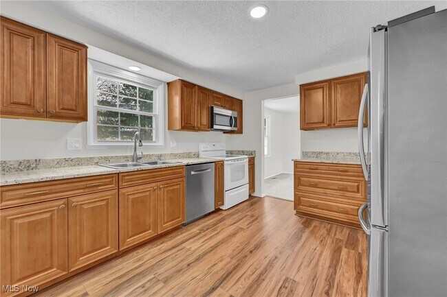 Building Photo - 5601 Sunset Dr