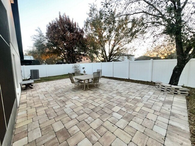 Building Photo - Lake Nona!! Spectacular 4X2 in Gated Nona Crest! All tile flooring!! 2 car garage! Move in April ...