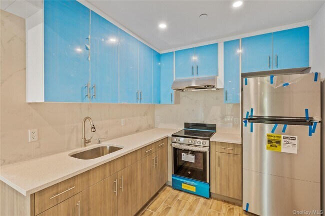 Building Photo - 213-41 38th Ave