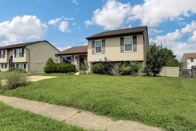 Building Photo - Spacious 4-Level Home with Deck, Workshop ...
