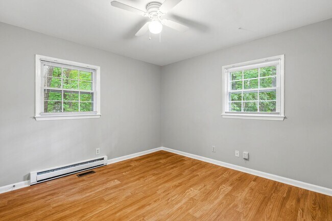 Building Photo - Updated Home, Stainless Steel Appliances, Wood Like Flooring, Deck, Garage!