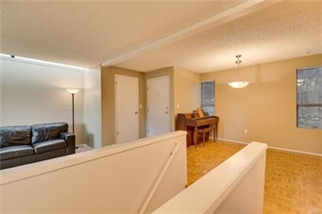 Building Photo - Freshly Updated 3BR Condo w/ Cozy Fireplace, Deck & 2 Parking