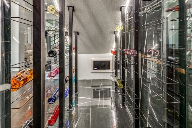 Building Photo - A must see in highly sought after Windsong...