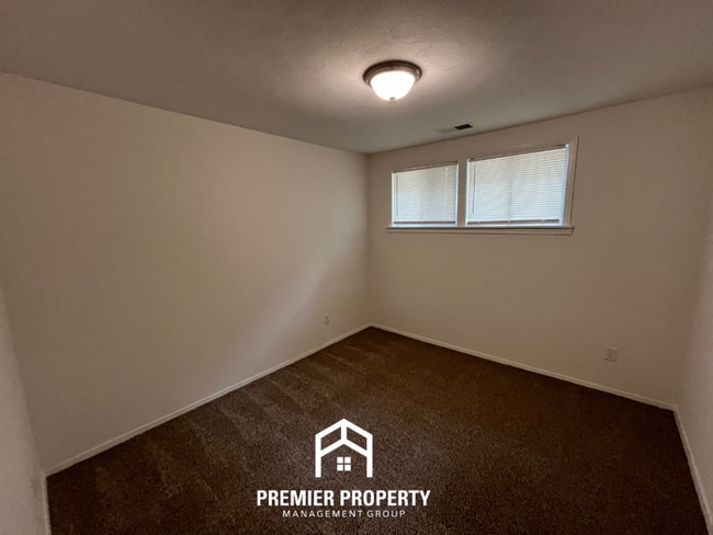 Building Photo - Spacious 3BR/2BA Home with Den & Living Room | Brick Fireplace & Large Yard