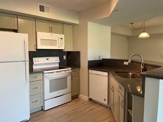 Building Photo - GORGEOUS 1 BEDROOM WITH WATER VIEWS IN PORTOFINO AT JENSEN BEACH