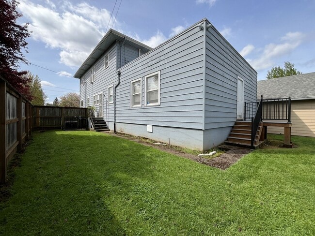 Building Photo - Expansive 4BR 2,900+ Sq Ft Home with Theater-Style Living Room & Bonus Hobby Workshop
