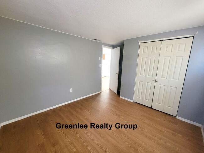 Building Photo - Cozy 2 Bed/1 Bath Duplex Apt with a Carport and Large Fenced Back Yard!