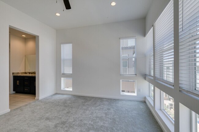 Building Photo - Stunning 4-Level Townhome in Inspirada | R...