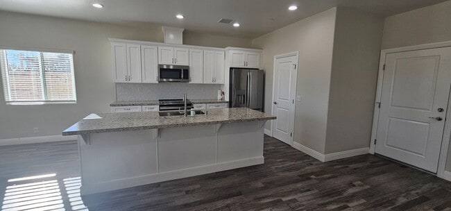 Building Photo - Beautiful Solar-Powered 4 Bedroom Home Built in 2021