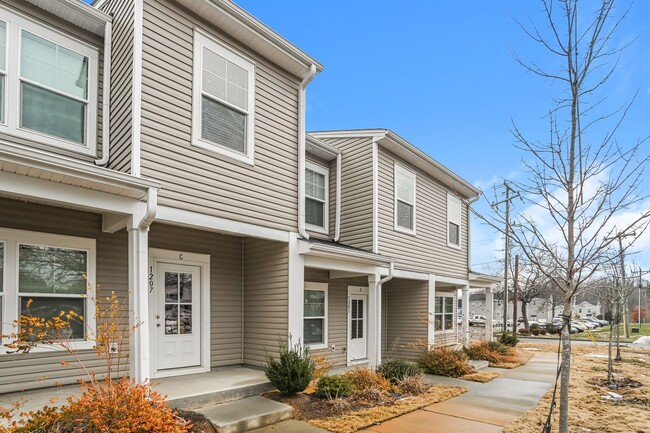 Building Photo - FIRST MONTH FREE - 3BR Townhome • Full Kitchen • Garage + Driveway